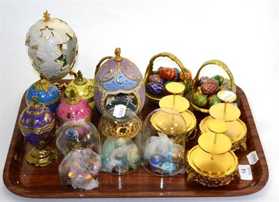 Lot 14 - Franklin Mint House of Faberge eggs in baskets with display domes and musical eggs