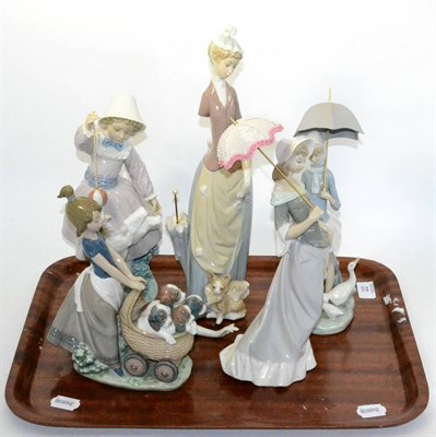 Lot 22 - Five various Lladro figures, elegant ladies with parasols etc