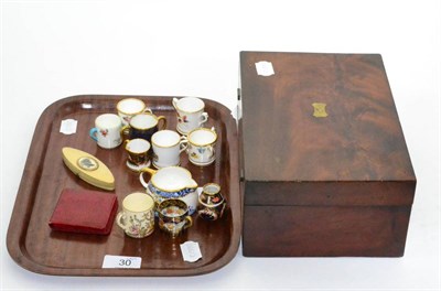 Lot 30 - A collection of porcelain miniature mugs and tygs etc together with a 19th century mahogany box...