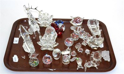 Lot 38 - A large collection of Swarovski crystal ornaments including a red deer stag, blue whale,...