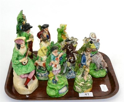 Lot 41 - A group of early 19th century Staffordshire pearlware bocage figures (9)