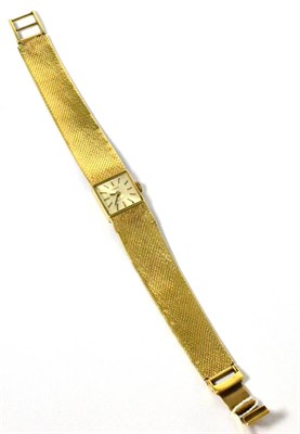 Lot 54 - A gold Tissot watch
