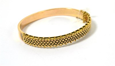 Lot 76 - A Victorian gold bangle stamped '10'