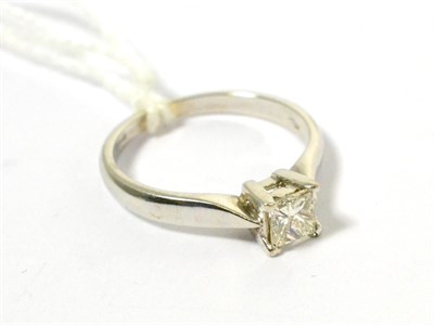 Lot 89 - A princess cut diamond solitaire ring, 0.60 carat approximately
