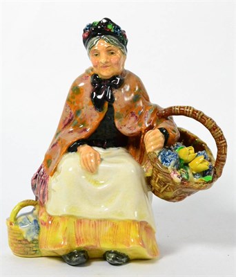 Lot 110 - A Royal Doulton figure ";The Old Lavender Seller"; HN1571