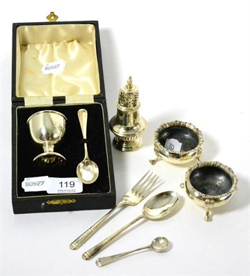 Lot 119 - A pair of silver cauldron salts, a silver pepperette, an egg cup and spoon set, etc