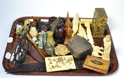 Lot 134 - A tray of 1920s ivory carvings, an Australian shell cameo decorated with a kangaroo, Japanese...