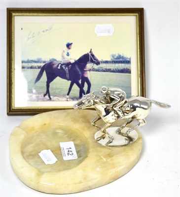 Lot 142 - A horse and jockey car mascot mounted on an alabaster ashtray, circa 1920, together with a...