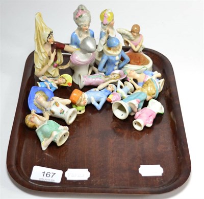 Lot 167 - A small group of Continental porcelain doll torsos and a small pin cushion