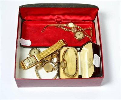 Lot 176 - A 9ct gold tank faced gent's wristwatch together with seven 9ct gold cased ladies wristwatches (8)