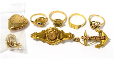 Lot 193 - Four 9ct gold dress rings, a 9ct gold locket, Victorian bar brooch stamped '9CT' and an anchor form