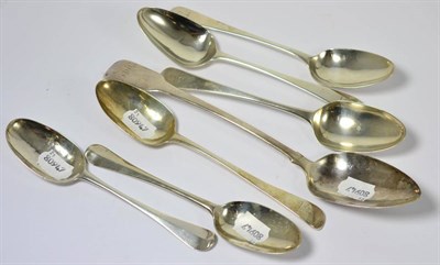 Lot 198 - Six Georgian silver table spoons and a basting spoon (7)