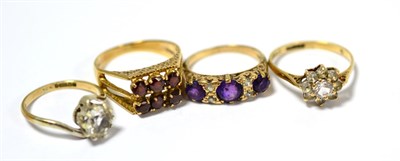 Lot 203 - Four 9ct gold stone set rings