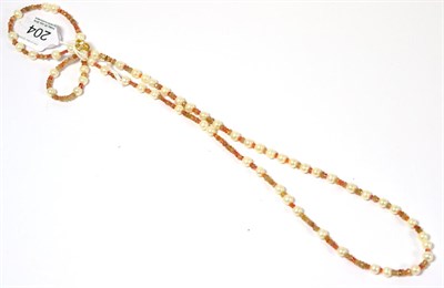 Lot 204 - A cultured pearl, orange sapphire and yellow zircon necklace, the cultured pearls spaced with...