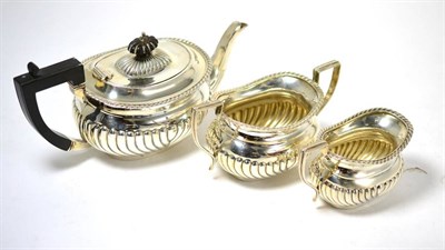 Lot 222 - A 19th century silver three piece tea set