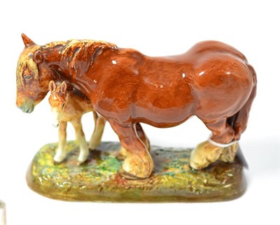 Lot 223 - A Royal Doulton horse and foal group, HN2533