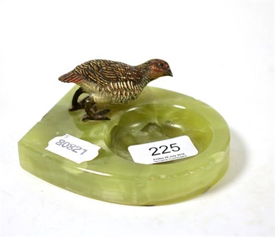 Lot 225 - An Austrian cold painted bronze grouse mounted on onyx ashtray