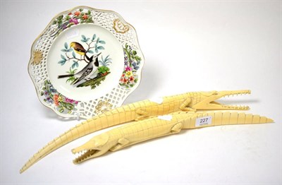 Lot 227 - Two early 20th century carved ivory crocodiles together with a 20th century Meissen plate...