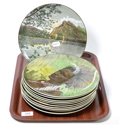 Lot 258 - Eleven Royal Doulton landscape and nature cabinet plates, D6473