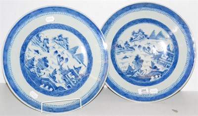 Lot 292 - A pair of decorative Chinese blue and white chargers