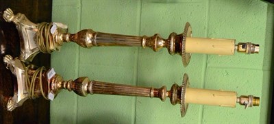 Lot 320 - A pair of modern decorative gilt metal candlestick form lamps