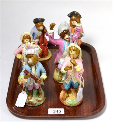 Lot 345 - A part set of six German monkey band or Affenkapelle figures, 20th century including conductor,...