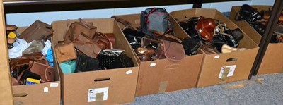 Lot 1029 - Four boxes of photographic equipment including cameras, lenses, accessories, etc