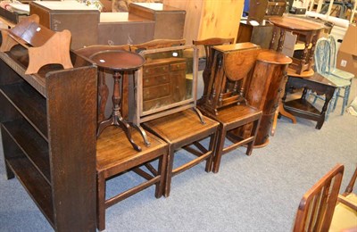 Lot 1046 - A group of furniture including a set of three George III oak plank seated dining chairs, two...