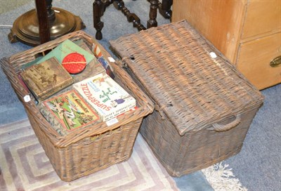 Lot 1050 - Two baskets of toys and puzzles