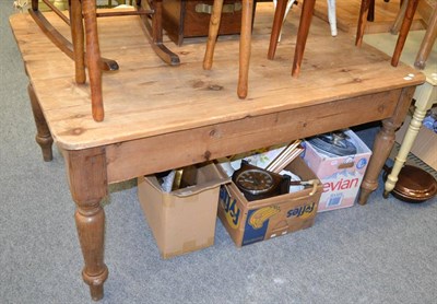 Lot 1056 - A pine farmhouse kitchen table