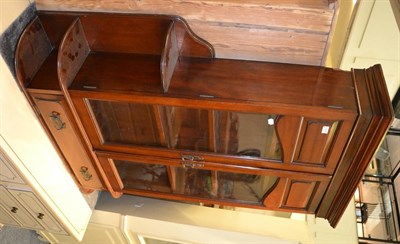 Lot 1069 - A late Victorian walnut glazed bookcase/cabinet