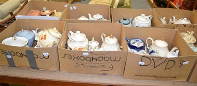 Lot 1074 - A quantity of teapots (in twelve boxes) and a rocking horse