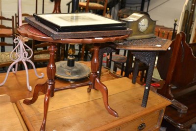 Lot 1075 - An Eastern carved table, a reproduction occasional table, a plated mantel clock and three...