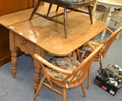 Lot 1082 - A pine table with single drawer