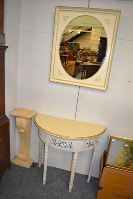 Lot 1088 - A painted and parcel gilt demi lune side table with matching mirror, together with an acanthus leaf