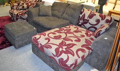 Lot 1141 - A modern good quality grey and crimson upholstered corner sofa together with matching footstool and