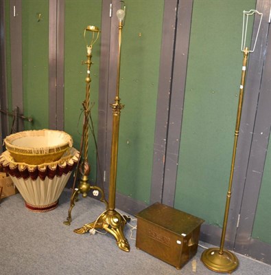 Lot 1142 - Three brass standard lamps including corinthian column example and a copper log box (4)