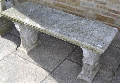 Lot 1149 - A composition bench (in three sections) 123cm long