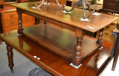 Lot 1262 - An oak coffee table with undertier