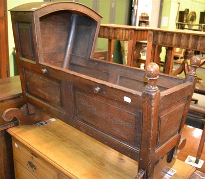 Lot 1271 - 19th century panelled oak crib