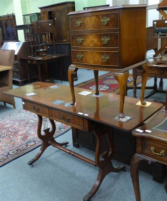 Lot 1276 - A reproduction bedside three height chest of drawers and a sofa table