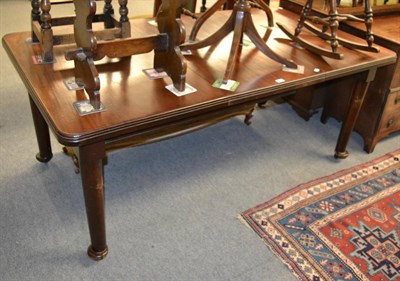 Lot 1280 - A mahogany dining table