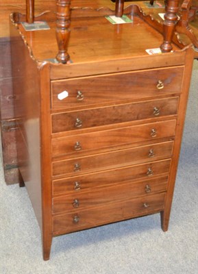 Lot 1285 - A mahogany tray topped five height bedside chest of drawers