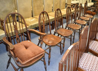 Lot 1303 - A set of eight spindle-back country chairs (including two carvers)