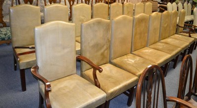 Lot 1304 - A set of sixteen mahogany framed leather dining chairs, including two carvers