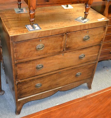 Lot 1313 - A 19th century mahogany three height chest of drawers