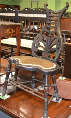 Lot 1319 - A 19th/20th century Liberty style chair, carved initials inside back leg