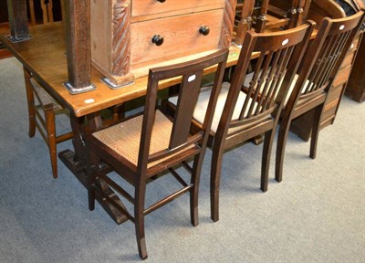 Lot 1335 - An oak refectory table, oak nest of three tables and six miscellaneous chairs