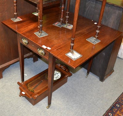 Lot 1343 - A 19th century mahogany drop leaf table, on tapering square section legs