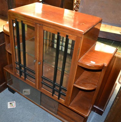 Lot 1347 - A 1950s glazed walnut display cabinet